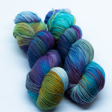 Load image into Gallery viewer, Bright and moody, this variegated colourway of blue, purple, green, bronze and maroon brings to mind beautiful art and objects of the past, tarnished by time but still gorgeously vibrant. "Remnants" is a celebration of worth and charm accumulated over time. Appreciate on its own or pair with Pluviophile and/or Petrichor.
